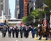 Daley walking in parade.