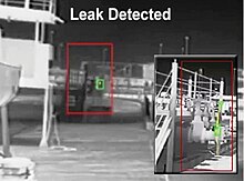 Thermal camera system with video analysis software detecting an oil leak from a valve at 50 feet and 150 feet in heavy rain.