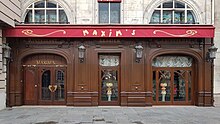 Ground floor wooden Art Deco façade, with the inscription "Maxim's'