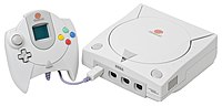 An NTSC Sega Dreamcast Console and controller with VMU.