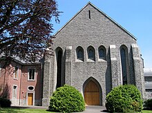 Photographie du mur de l'église abbatiale.