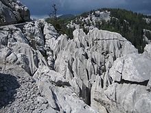 Vertically-cracked grey rock