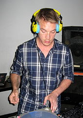 Diplo playing at his DJ booth.