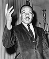 Martin Luther King Jr., activist american, militant pentru apărarea drepturilor civile ale persoanelor de culoare din Statele Unite, laureat al Premiului Nobel