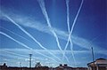 Image 34Water vapor contrails left by high-altitude jet airliners. These may contribute to cirrus cloud formation. (from Aviation)