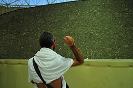 A Haji participating in the ritual of Jamarat