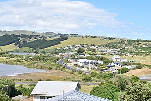 Ocean Grove sits close to the southern shore of Tomahawk Lagoon's two lobes- the Bottom Lagoon is visible at the lower left, and the Top Lagoon can be seen behind it.