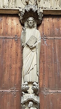 Central doorway of the south portal, with column statue of Christ. His feet rest on a lion and a dragon.