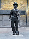 The statue in Leicester Place in 2014