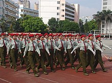 Mynd sem sýnir herþjálfun í Guangxi kennaraháskólanum í Nanning borg í Kína.