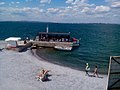 Beach and pier on the island of St. Anastasia. Burgas can be seen on the horizon