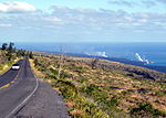 Lava from Puʻu ʻŌʻō flows through subsurface lava tubes until it meets the ocean, creating the steam plumes seen in the distance from Chain of Craters Road