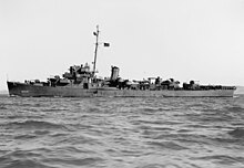 Black and white photograph of a ship at sea