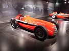 A red Alfa Romeo 158 Alfetta 1950 in a museum