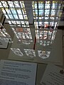 Maughan Library's stained glass reflected on exhibition cases