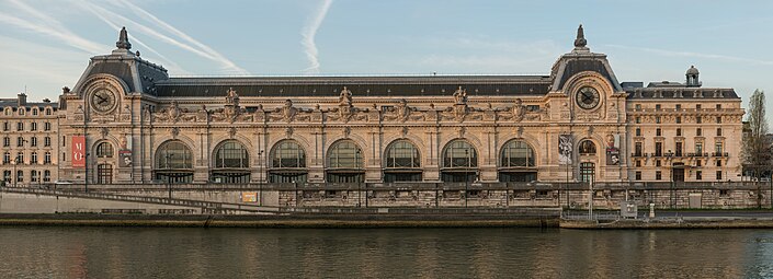 Beaux Arts Doric pilasters on the facade of the Gare d'Orsay, Paris, designed by Victor Laloux in c.1896-1897, and built in 1898-1900[28]