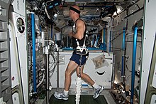 Astronaut running on a track