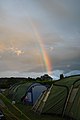 Rainbow over tents