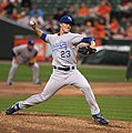 Image 2 Zack Greinke Photo: Keith Allison Zack Greinke is a pitcher for the Major League Baseball team Milwaukee Brewers. He began his career with the Kansas City Royals (as pictured here), during which time he won the American League Cy Young Award, given to the league's best pitcher. In December 2010, Greinke asked to be traded, saying he was not motivated to play for a rebuilding team. More selected pictures