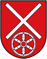 Gules a fillet saltire couped argent above a wheel of the same (Klein-Winternheim)