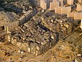 Image 35By 1990, the Kowloon Walled City contained 50,000 residents within its 2.6-hectare (6.4-acre) borders. (from History of Hong Kong)