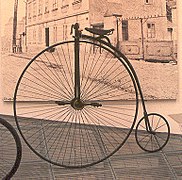 A เพนนี-ฟาร์ธิง or ordinary bicycle photographed in the Škoda Auto museum in the Czech Republic