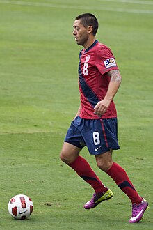 Clint Dempsey on the pitch, the ball in front of him