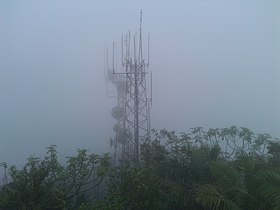 Towers atop El Yunque from Mameyes II on a cloudy day