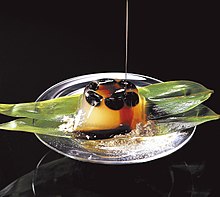 a translucent jelly with black soybeans visible inside