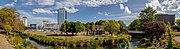 panoramic view of empty land, with an artwork in the foreground