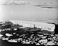 Image 5An iceberg being pushed out of a shipping lane by (L to R) USS Burton Island, USS Atka, and USS Glacier near McMurdo Station, Antarctica, 1965 (from Southern Ocean)