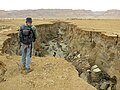 Erosional gully in Dead Sea sediments; southwestern shore of the Dead Sea, Israel; this gully was excavated by floods in less than a year.