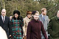 From left to right: The Duke of Cambridge (now Prince of Wales), The Duchess of Cambridge (now Princess of Wales), Ms. Meghan Markle (now Duchess of Sussex), Lady Louise Windsor, Prince Harry (now Duke of Sussex) on Christmas Day (25 December 2017)