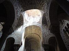 Interior of the Panagia church at the monastery of Hosios Loukas, showing the central dome supported on four columns