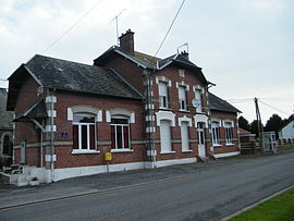 The town hall and school in Grandcourt
