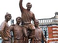 football World Cup Sculpture: Bobby Moore, Geoff Hurst, Martin Peters and Ray Wilson (Philip Jackson, 2003) Upton Park, West Ham