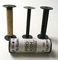 Original 120, 620 and modern 120 film spools with modern 120 exposed color film