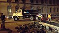 Image 2Construction crew laying down asphalt over fiber-optic trench, in New York City (from Road surface)