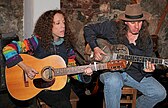 Modern guitars, acoustic (left), resonator guitar (right)