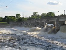 A photo of the original Coon Rapids dam and powerhouse in 1928.