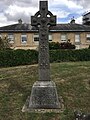 The grave of George Finch in the churchyard of Holy Cross Church, Burley