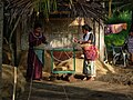 Women at work in a small scale coir spinning unit at Kollam