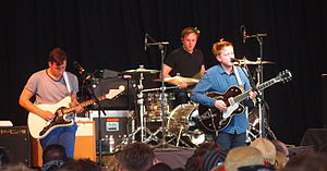 Two Door Cinema Club performing