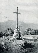 Young Mirdita man near a cross (1912)