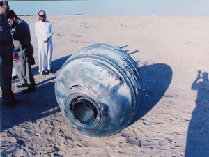 Saudi officials inspect a PAM-D module that re-entered the atmosphere in 2001
