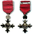 The MBE medal with civil ribbon. Scanned by a wikipedian