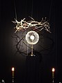 Monstrance as part of a postmodern Easter "Tomb of the Lord" scene in a church in Warsaw, Poland.