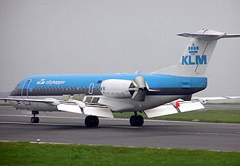 KLM cityhopper Fokker 70 with spoilers/airbrakes deployed