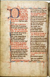 Photo of a manuscript page with two columns of text starting with a large decorated capital D