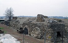 Roman ruins: a vaguely rectangular platform on which fragments of a stone-block structure can be seen